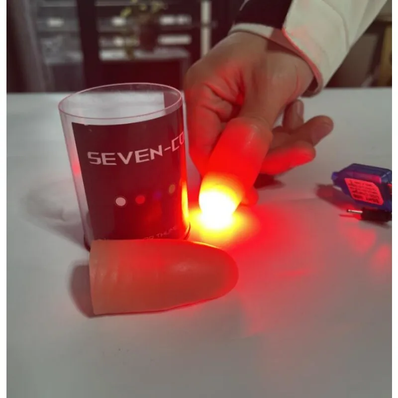 Seven Colors LED Light Thumb T - огляд і ціна Thumb Tip Magic Trick Set